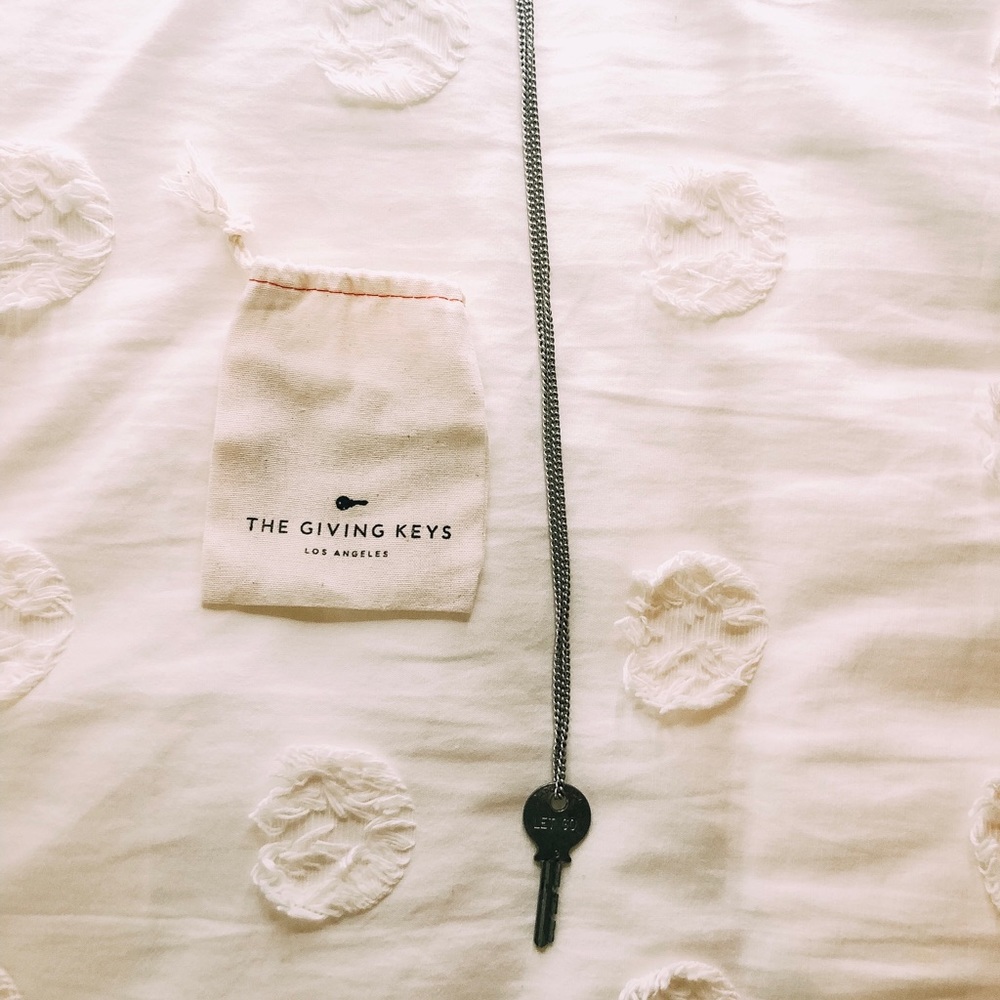 let go giving key necklace